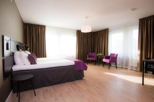 Postel nebo postele na pokoji v ubytování Best Western Plus Park Airport Hotel