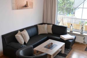 Posezení v ubytování _DKK11_ Ferienwohnung Strandburg