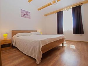 Łóżko lub łóżka w pokoju w obiekcie House Andrej 1372