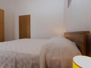 Łóżko lub łóżka w pokoju w obiekcie House Andrej 1372