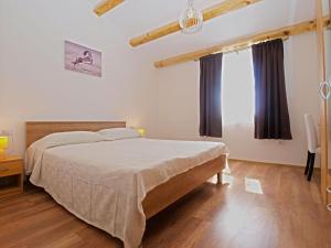 Łóżko lub łóżka w pokoju w obiekcie House Andrej 1372