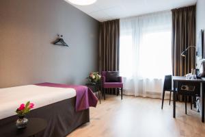 Postel nebo postele na pokoji v ubytování Best Western Plus Park Airport Hotel