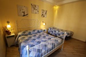 Posteľ alebo postele v izbe v ubytovaní B&B Rome With Love