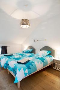 Ένα ή περισσότερα κρεβάτια σε δωμάτιο στο Le 225