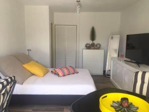 Postel nebo postele na pokoji v ubytování C'Renity Studio + 12 fotografií