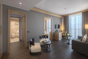 A television and/or entertainment centre at Domina Milano Fiera