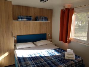 Postel nebo postele na pokoji v ubytování Camping Taimì