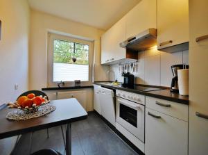 Η κουζίνα ή μικρή κουζίνα στο Komfort-Fewo Ettelsberg-Panorama