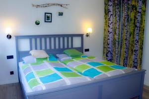 Ein Bett oder Betten in einem Zimmer der Unterkunft Ferienwohnung Saalhausen Sauerland