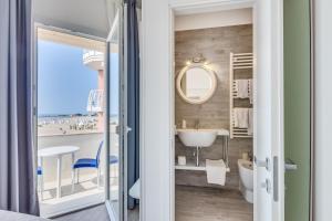 Koupelna v ubytování Hotel Garni' Serena + 37 fotografií