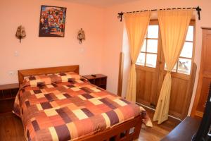 Cama o camas de una habitación en Departamentos Cusco