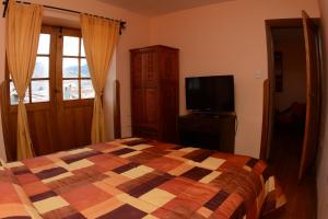Cama o camas de una habitación en Departamentos Cusco