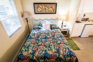 Postel nebo postele na pokoji v ubytování Ocean Inn + 37 fotografií