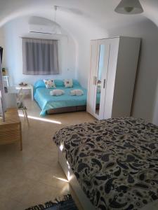 Postel nebo postele na pokoji v ubytování Casa Bianco e Blu