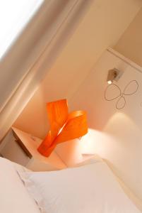 Postel nebo postele na pokoji v ubytování Hostal riMboMbin