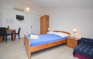 Postel nebo postele na pokoji v ubytování Apartments Mara