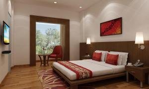 Lemon Tree Hotel Alwar客房内的一张或多张床位