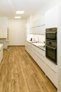 Η κουζίνα ή μικρή κουζίνα στο Convenience & Chic by the Basilica