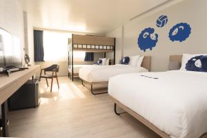Postel nebo postele na pokoji v ubytování Kokotel Krabi Oasis