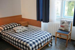 Postel nebo postele na pokoji v ubytování Hotel Veli Jože