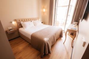 Postel nebo postele na pokoji v ubytování Hotel Casa Peya - Adults Only