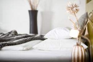 Postel nebo postele na pokoji v ubytování Spa Hotel Bründl