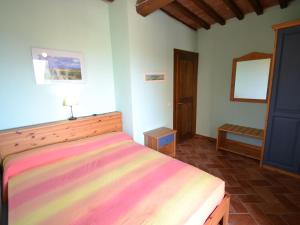 Posteľ alebo postele v izbe v ubytovaní Apartment in Asciano with Panoramic Views