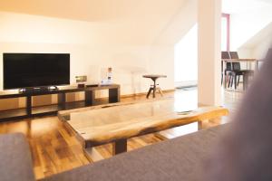 TV a/nebo společenská místnost v ubytování Flair Hotel Nieder
