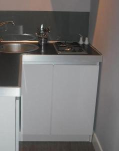 Kuchyňa alebo kuchynka v ubytovaní Apartamenty Algador + 23 fotografií