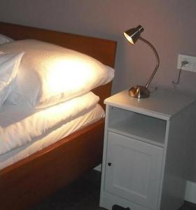 Posteľ alebo postele v izbe v ubytovaní Apartamenty Algador