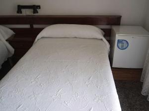 Postel nebo postele na pokoji v ubytování Pensión K-Hito