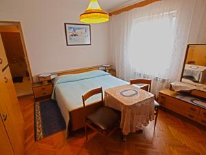 Postel nebo postele na pokoji v ubytování Rooms Milan 1370