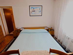 Postel nebo postele na pokoji v ubytování Rooms Milan 1370