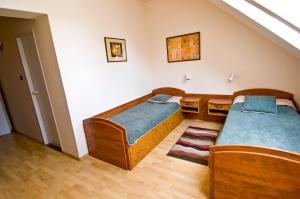 Krevet ili kreveti u jedinici u okviru objekta Hotel Relax u Drsů
