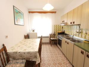 Kuchyň nebo kuchyňský kout v ubytování Rooms Milan 1370