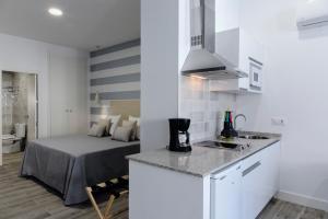 Kuchyňa alebo kuchynka v ubytovaní Hotel Apartamentos MPD