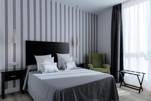 Posteľ alebo postele v izbe v ubytovaní Hotel Apartamentos MPD