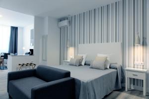 Posteľ alebo postele v izbe v ubytovaní Hotel Apartamentos MPD