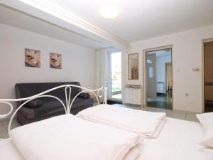 Postel nebo postele na pokoji v ubytování Apartments Zorka 1421