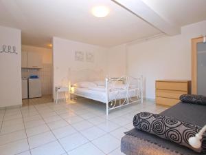Postel nebo postele na pokoji v ubytování Apartments Zorka 1421