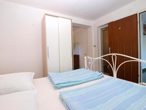 Postel nebo postele na pokoji v ubytování Apartments Zorka 1421