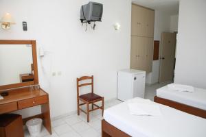 Posteľ alebo postele v izbe v ubytovaní Hotel Kathrin Beach