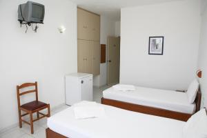 Posteľ alebo postele v izbe v ubytovaní Hotel Kathrin Beach