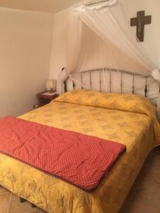 Ένα ή περισσότερα κρεβάτια σε δωμάτιο στο Family Home in Cerreto Laghi