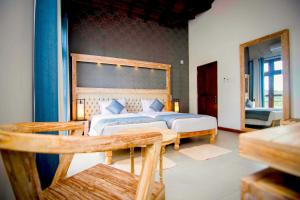 a bedroom with a large bed in a room at Rivora Residence in Kandy +53 photos