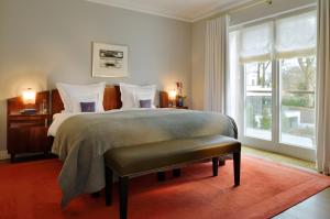Cama o camas de una habitación en Hotel Louis C. Jacob