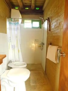 Koupelna v ubytování Casa Aguai + 9 fotografií