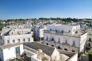 an aerial view of a city with buildings at Hotel Lanzillotta in Alberobello