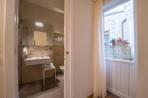 Koupelna v ubytování Hotel Il Palazzo + 37 fotografií