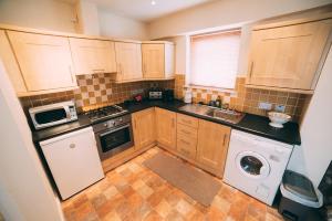 Køkken eller tekøkken på City centre penthouse apartment + 5 billeder